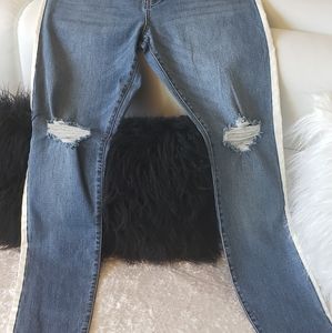 Forever 21 ripped at the knees jeans. Never worn.